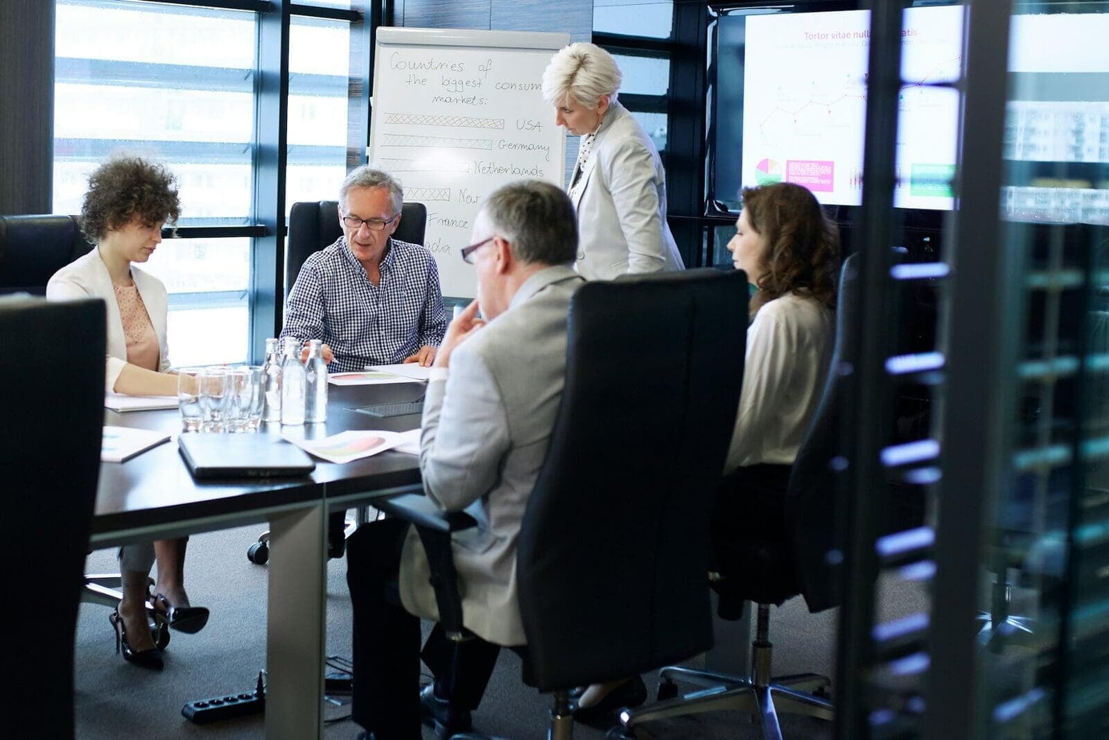 Executive team work session around conference table